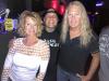 Shelly & hubby Brian, Surreal guitarist, w/ Purple Moose owner Bobby (ctr.) during another rockin' night of music.